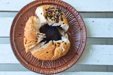bun with sesame seeds stuff chocolate