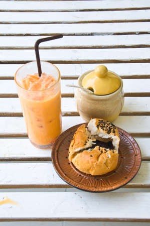 frappe tea and bread in coffee shopの写真素材