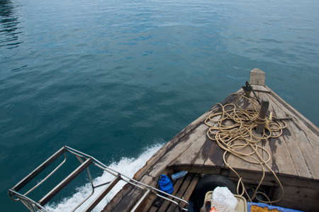 The waves from a wood boatの写真素材