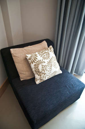 decorative pillows with a pattern on a  sofaの写真素材