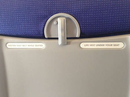 Airplane safety advice Life-vest under seat