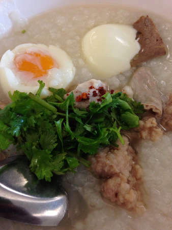 Asian style breakfast soft boiled rice, rice soup Thailand food の素材