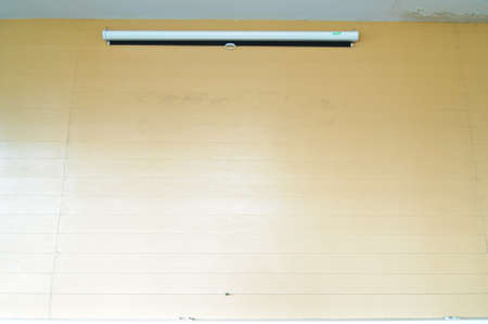 Blank Projection screen in wallの写真素材