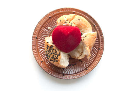 A marriage proposal using a fortune bread and gold ring の写真素材