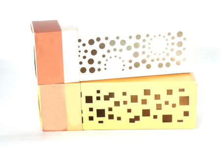 white and gold cardboard box isolated on a white backgroundの写真素材