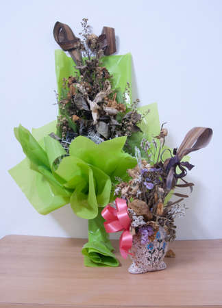 Photo of bouquet made up of withered flowersの写真素材