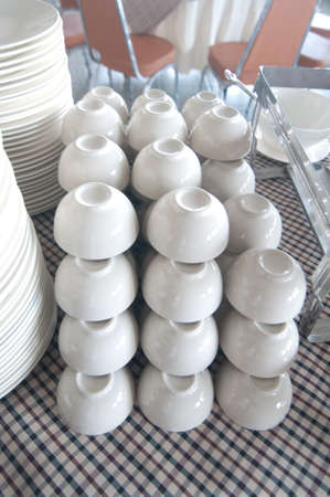 empty bowls, plates, cups for buffetの写真素材
