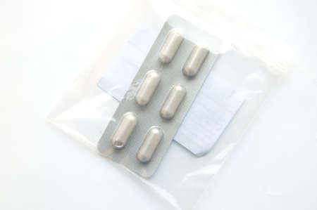 Pack of tablets on a tableの写真素材