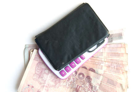 close up of 1000 baht banknotes and calculatorの写真素材