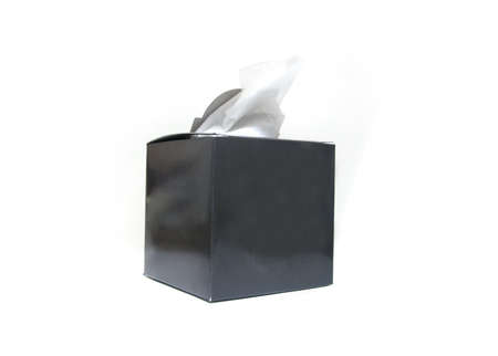paper napkin in black paper box on whiteの写真素材