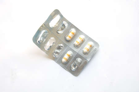 Pack of tablets on a tableの写真素材