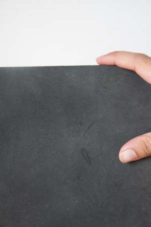 hands holding black empty pad - with using pathの写真素材
