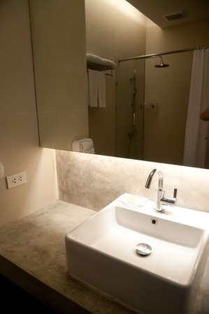 white sink with chrome faucetの写真素材