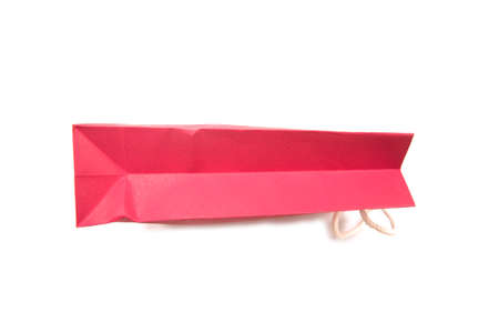 Red shopping bag on white backgroundの写真素材
