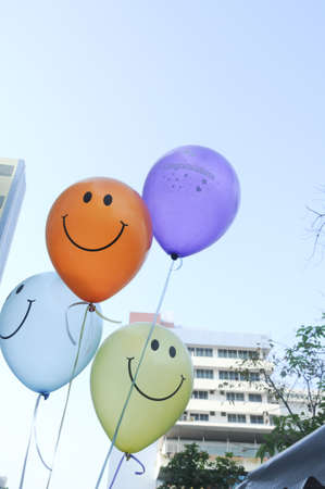 bunch of colorful balloons smileの写真素材