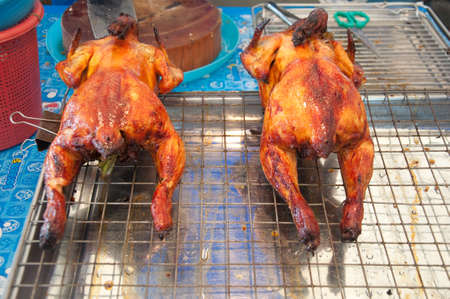 roasted chicken thai style for sale at marketの写真素材