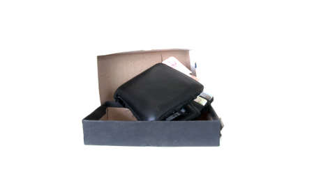Open brown leather wallet with money in boxの写真素材