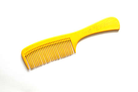 old hair comb isolated on white backgroundの写真素材