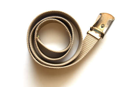 Old Scout belt on white backgroundの写真素材