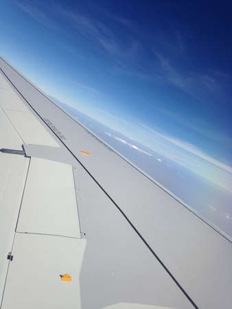 Airplane on blue skyの素材