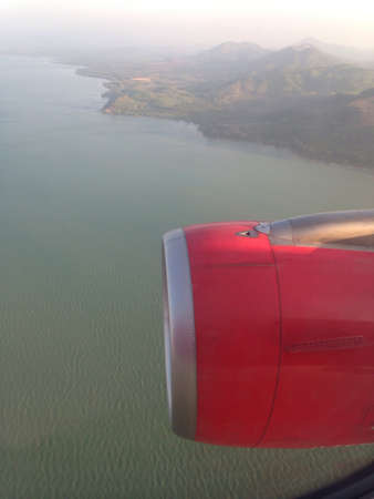 Airplane on sky view of seaの素材
