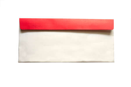 Old red postage envelope on white