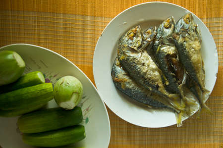 Fried Mackerel fish with vegetableの写真素材
