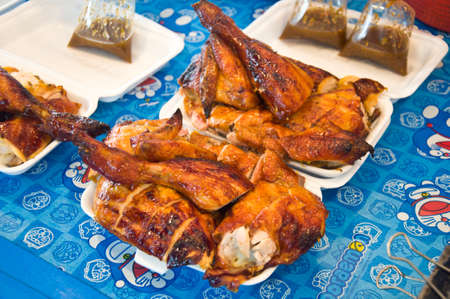 roasted chicken thai style at Thai marketの写真素材