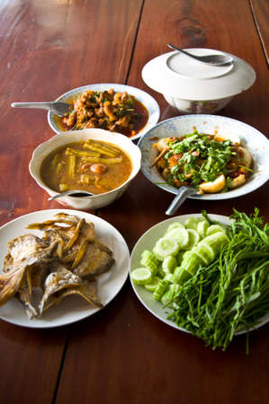 Set of Thai food popular menu on table woodの写真素材