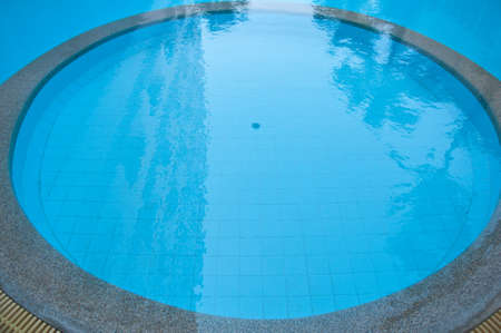 Small swimming pool in a yardの写真素材
