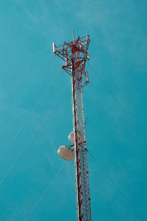 high voltage post on blue skyの写真素材