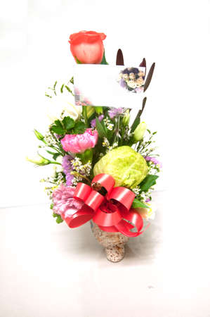 flowers in a vase on whiteの写真素材