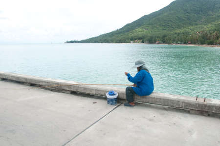 woman Catching a Fishの写真素材