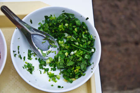 Thai food ingredient for porridge rice gruel in bowlの写真素材