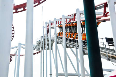 moving roller coaster on white skyのeditorial素材