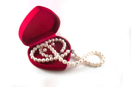 pearls in a red gift boxの写真素材