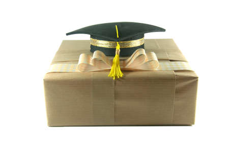 Graduation hat on   gift box a white backgroundの写真素材