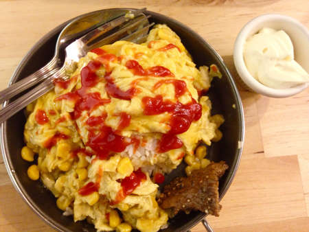 Scrambled egg with corn and tomato sauceの素材
