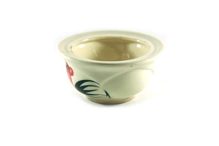 Old style thai ceramic bowl on whiteの写真素材