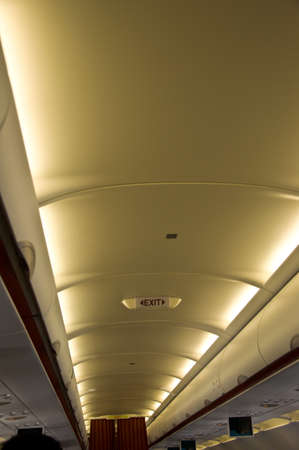 Exit sign in airplaneのeditorial素材