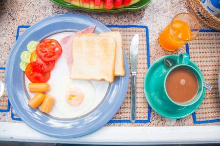 Breakfast with orange juice and coffee