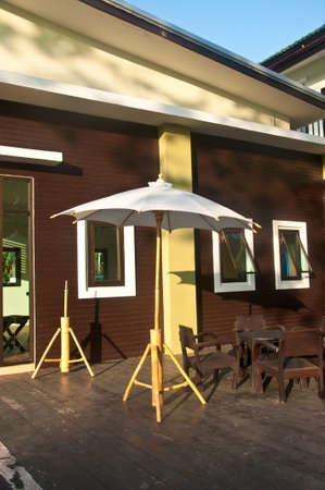 Outdoor chair with umbrella in the terraceのeditorial素材