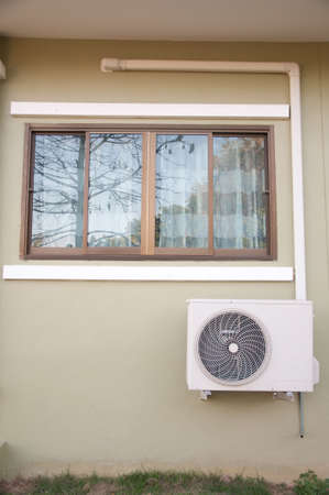 The sliding glass window and air conditionerのeditorial素材