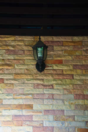 old rusty lantern on brick wallのeditorial素材