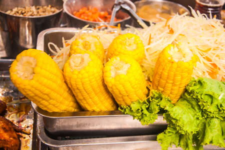 close up steam corn in marketの写真素材