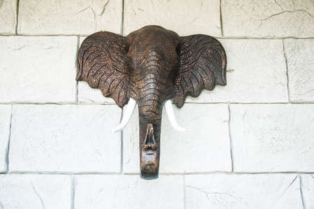 ancient wood carving elephantsの写真素材