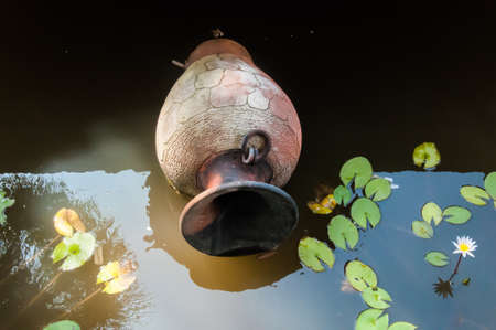 native Vase of Thai pottery. (Thai Earthenware) mini water fall for house decorationの写真素材