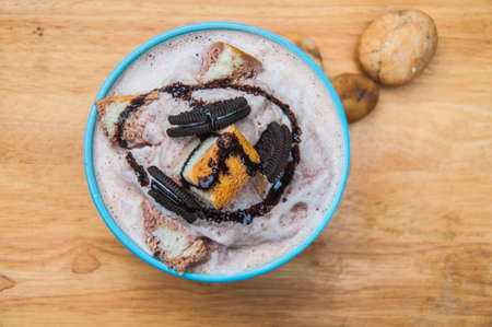 Ice frappe with Chocolate Flavored, cookies, bread and condensed milk.の写真素材