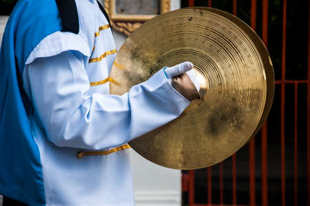 Cymbals in hand- School Marching Bandの写真素材