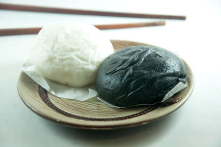 Steamed bun - black and white on white backgroundの写真素材